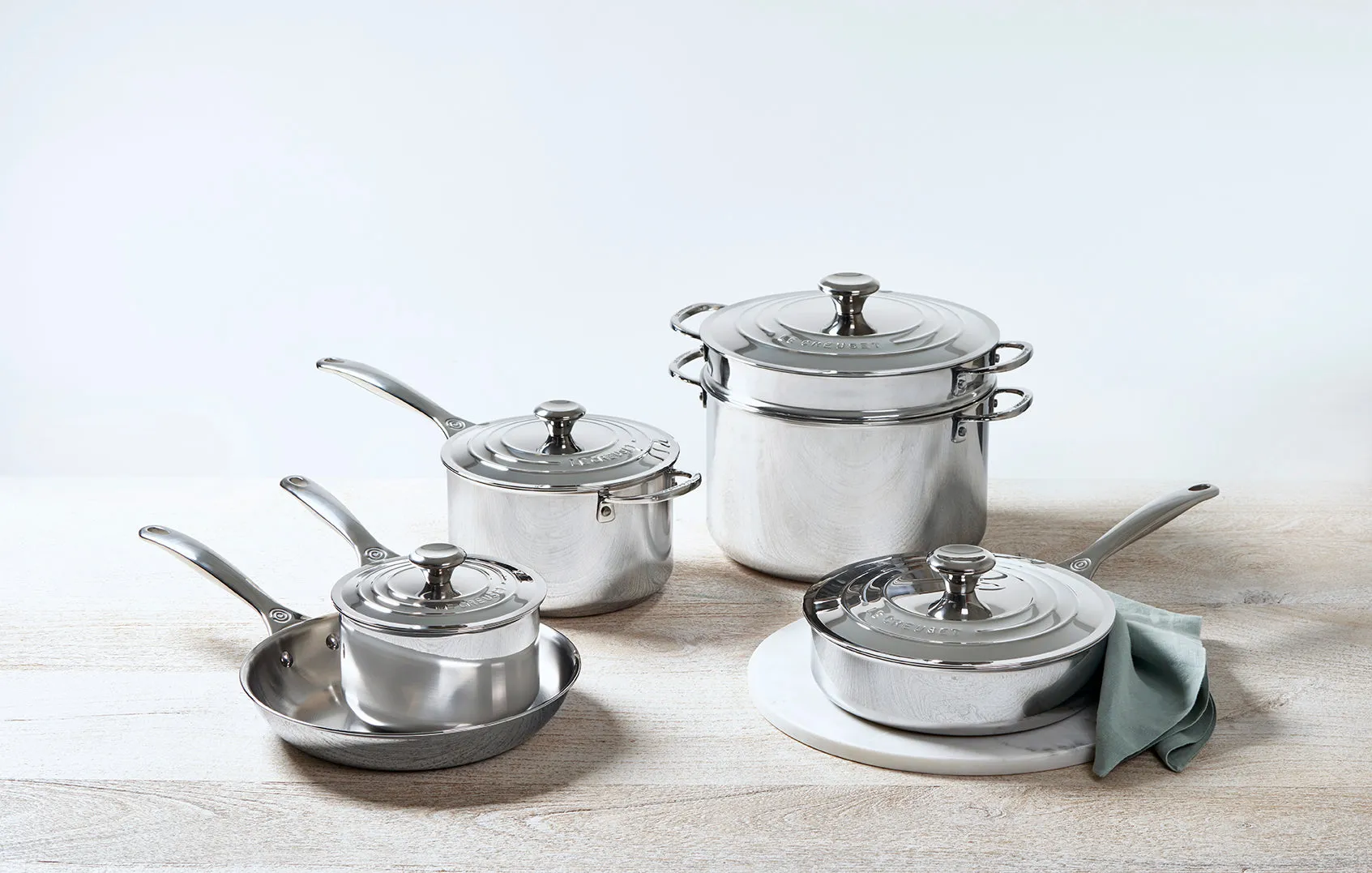 10-Piece Set (10" Fry Pan, 2 & 4 qt. Saucepans w/ Lids, 3 qt. Saute Pan w/ Lid, 9 qt. Stockpot w/ Lid & Deep Colander Insert)