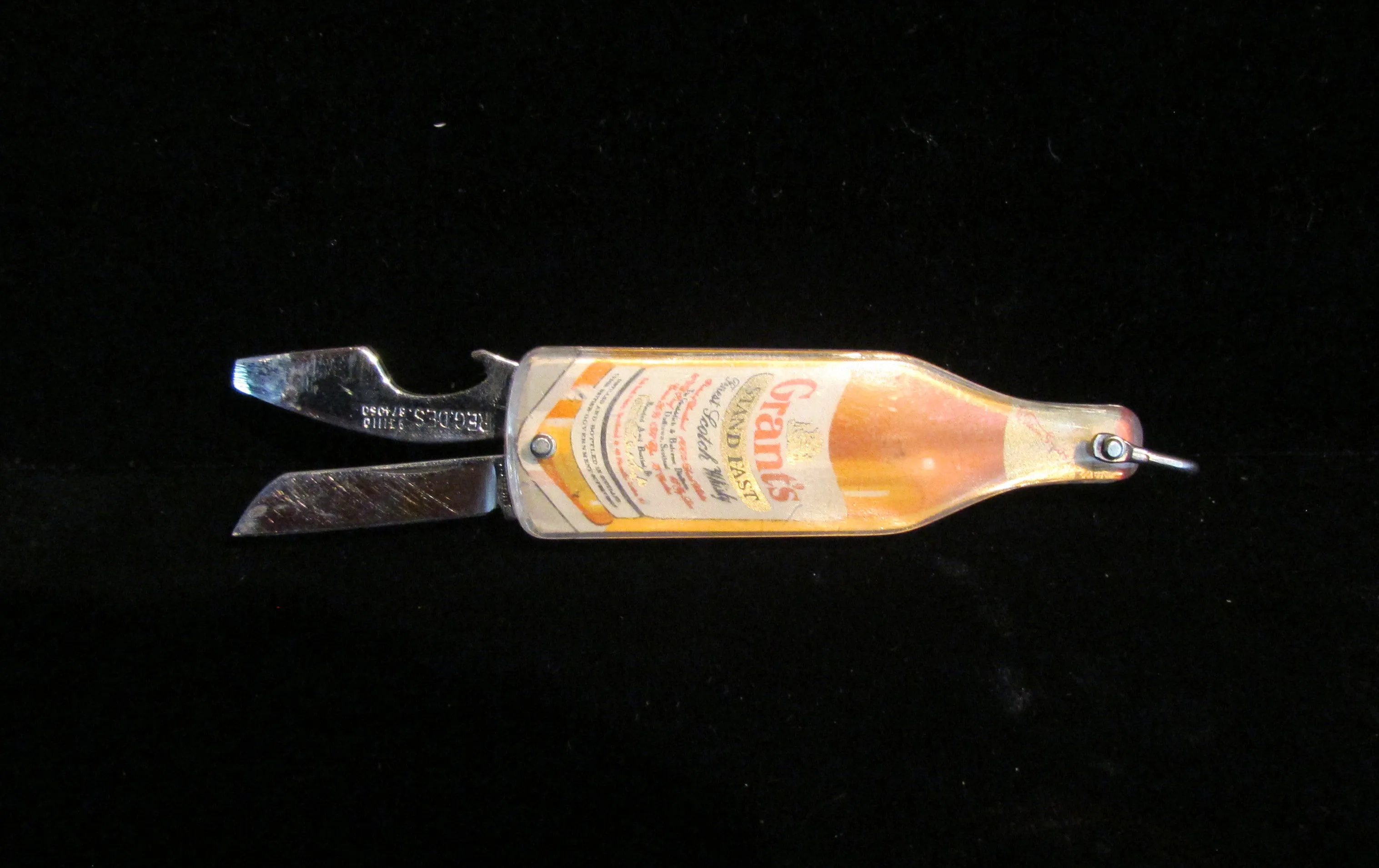 Vintage Grants Finest Scotch Whiskey Pocket Knife Bottle Opener Figural Advertising